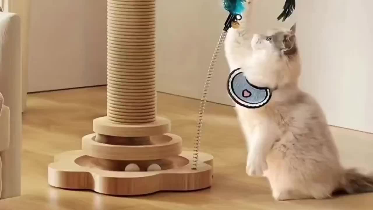 This Is a Multifunctional Wooden Scratching Post for Indoor for cats, Featuring a Tall Design, a Two-Level Track Ball, an Interactive Feather Toy, And Hanging Balls. It'S Durable And Mess-Free, Making It Ideal for Both Kitten